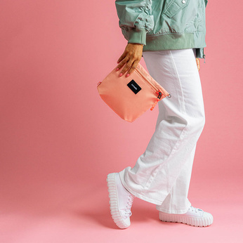 Pacsafe GO anti-theft pouch bag - pink