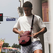 Folding women's anti-theft bag Pacsafe Go - burgundy