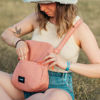 Folding women's anti-theft bag Pacsafe Go - pink