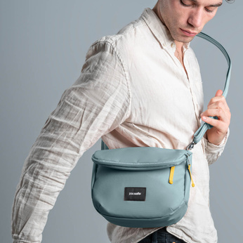 Folding anti-theft women's handbag Pacsafe Go - mint